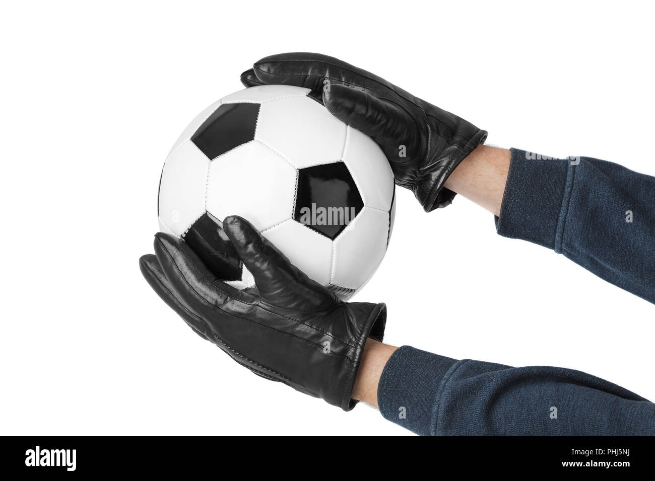 Goalkeeper hands and soccer ball Stock Photo - Alamy