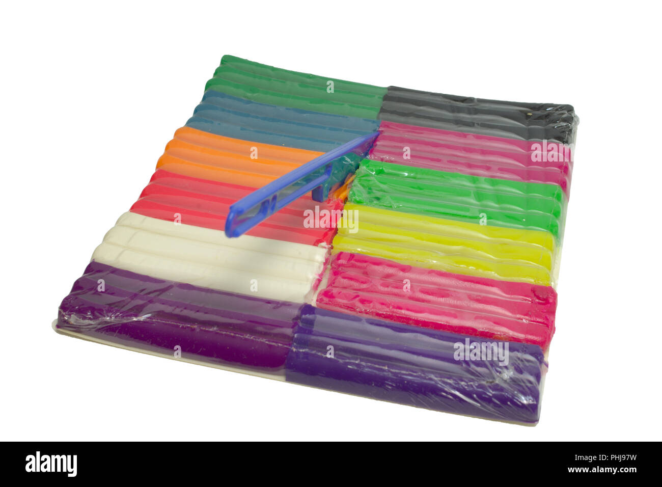 plasticine isolated ; multicolored set with unusual fluorescent features and simple modeling tool Stock Photo