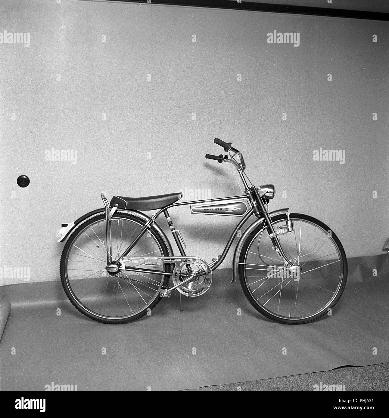 1950s bicycle. A childrens bicycle model Speed Cross  Crescent. A design with the space age in mind and a rocket pictured on the design tank. A model that was considered the coolest thing around for a child of the 1950s with high handlebars, front drum break and a loaf seat. Sweden 1956 ref CV15-9 Stock Photo