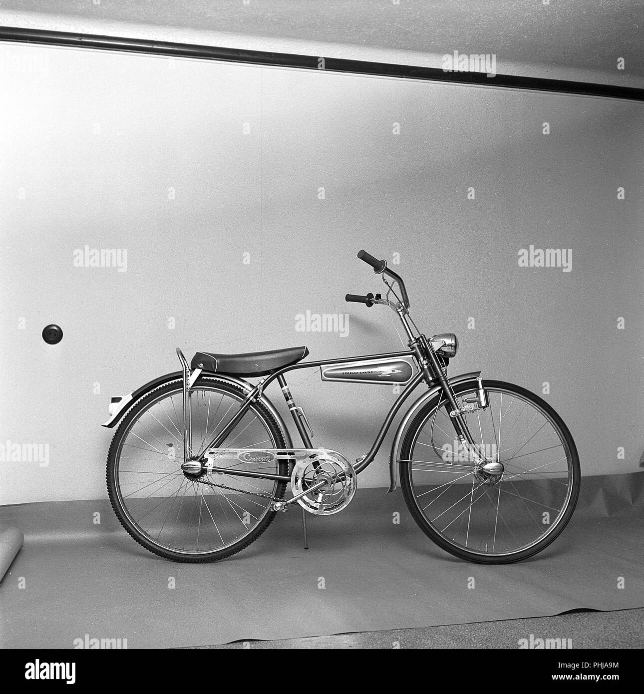1950s bicycle. A childrens bicycle model Speed Cross  Crescent. A design with the space age in mind and a rocket pictured on the design tank. A model that was considered the coolest thing around for a child of the 1950s with high handlebars, front drum break and a loaf seat. Sweden 1956 ref CV15-9 Stock Photo