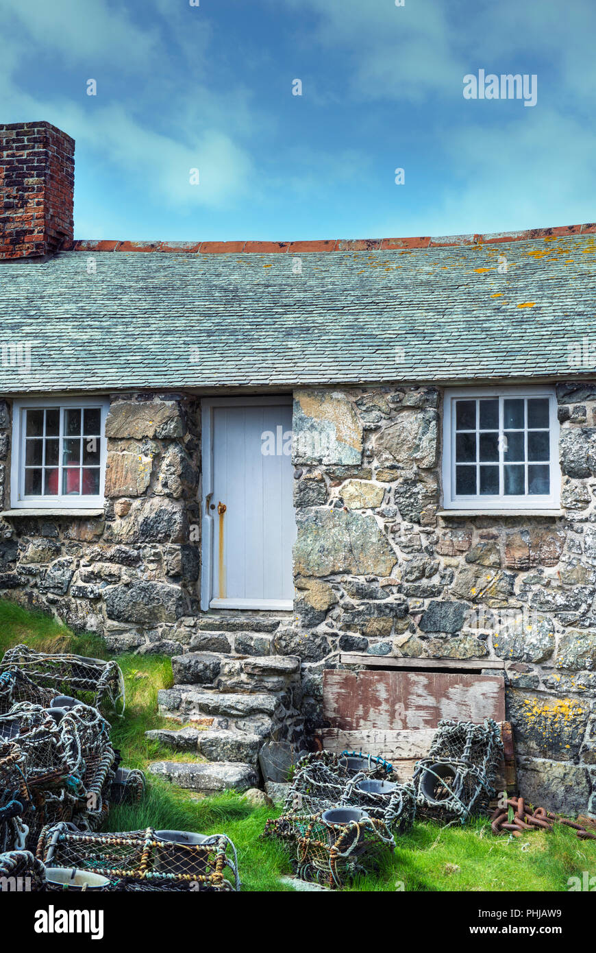 Old fisherman's cottage in Mullion Cove, Cornwall, England, UK Stock Photo