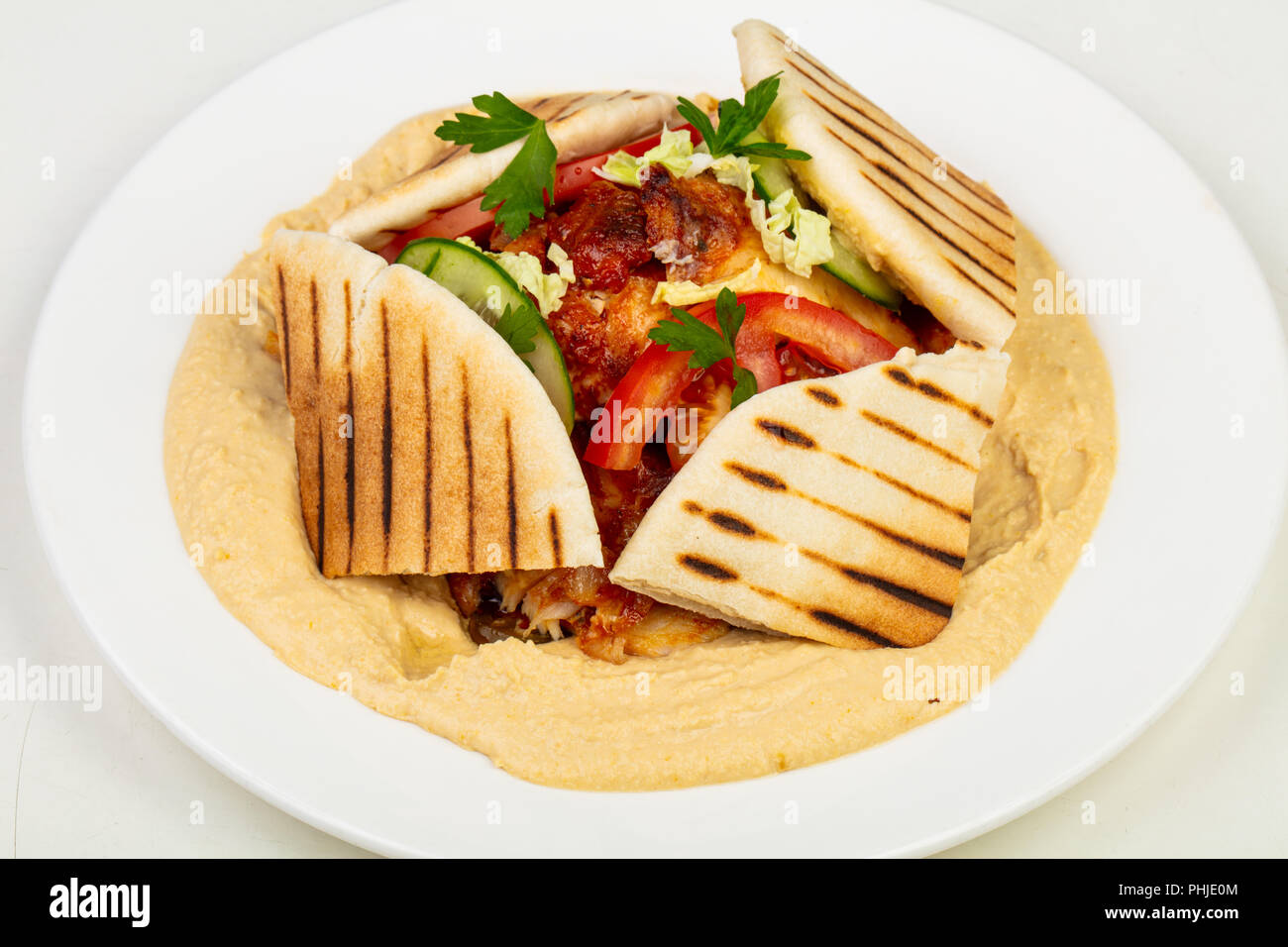 Humus with shawarma and pita Stock Photo - Alamy