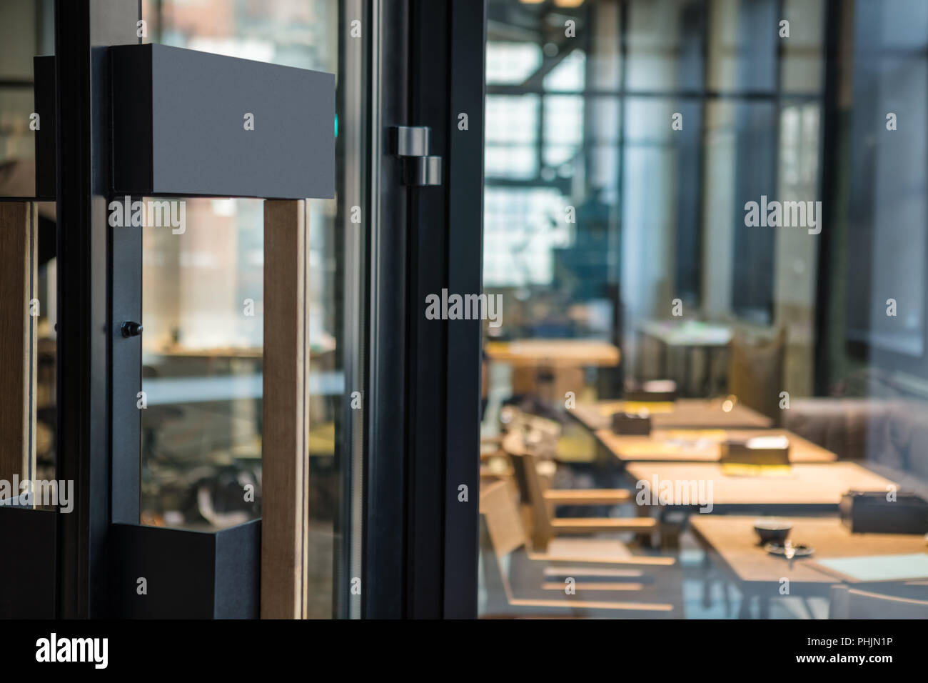 Restaurant door handle with pull sign on glass doors Stock Photo Alamy