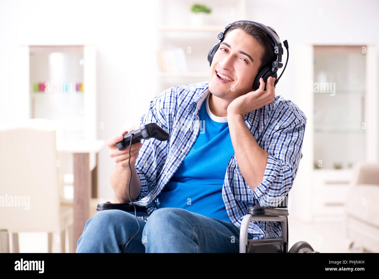 Disabled man playing computer games during rehabilitation Stock Photo Alamy