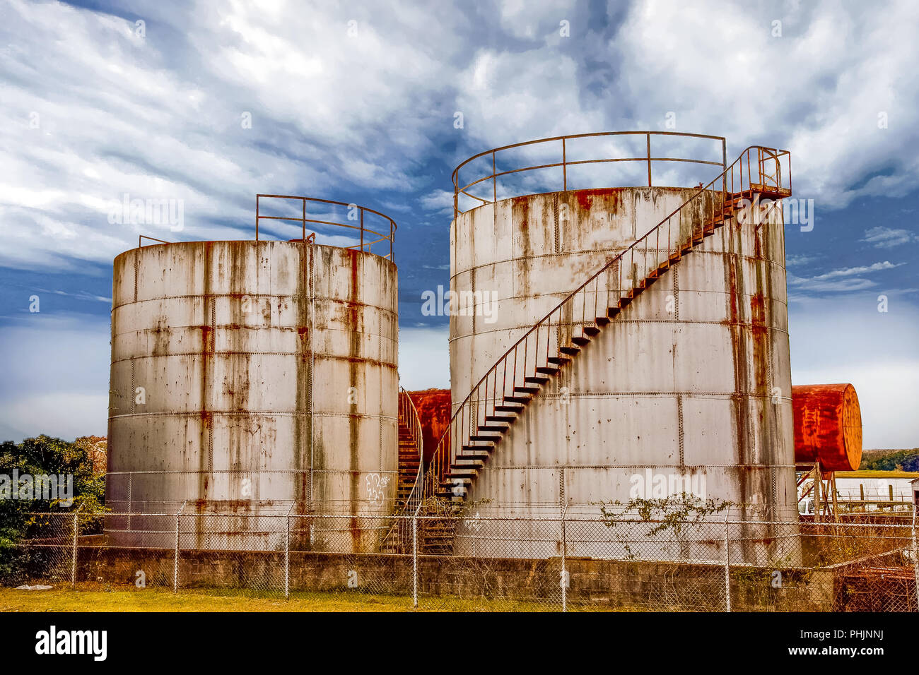Old Storage Tanks with stairs leading to top Stock Photo Alamy