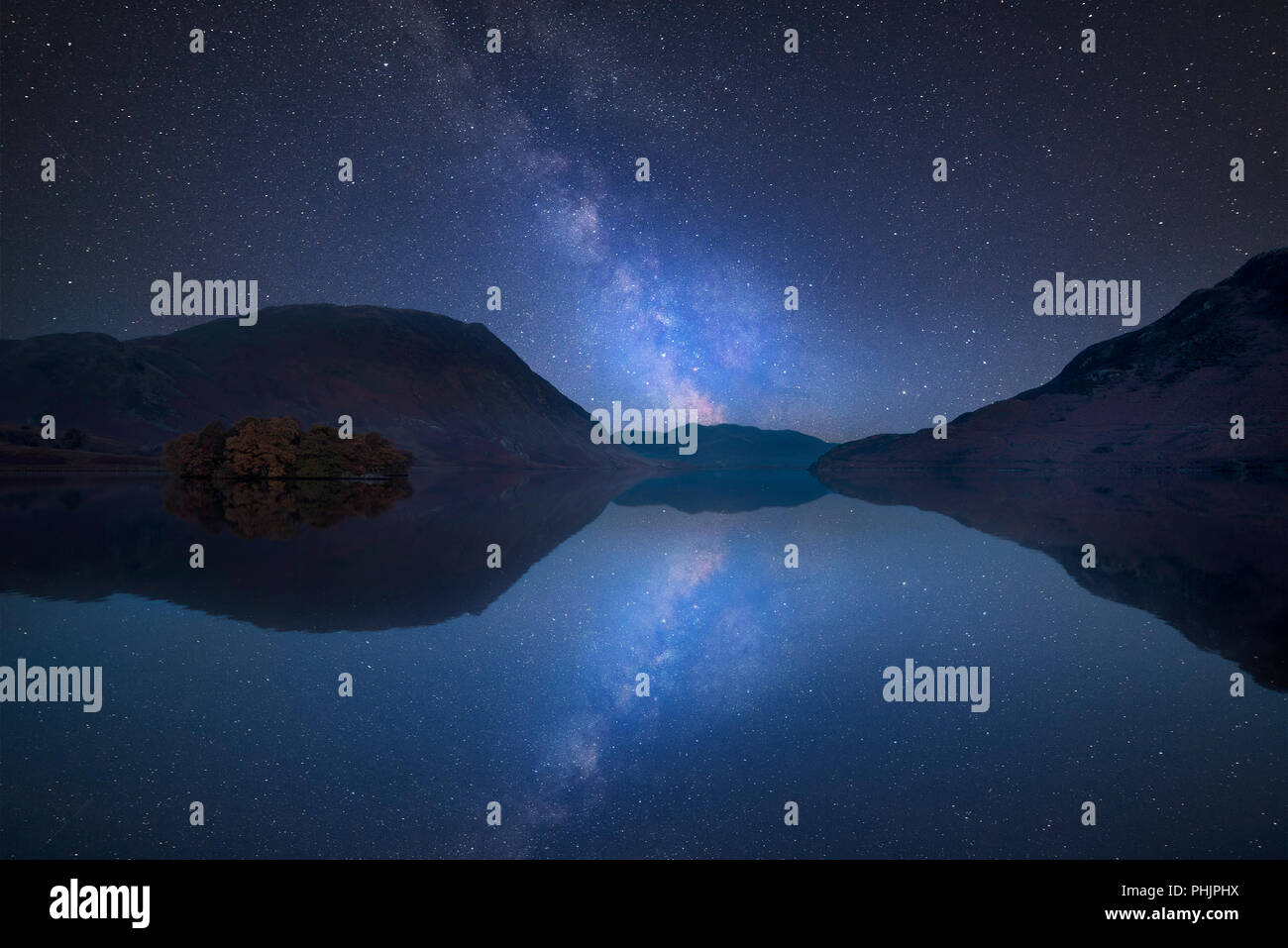 Stunning vibrant Milky Way composite image over landscape of Crummock ...