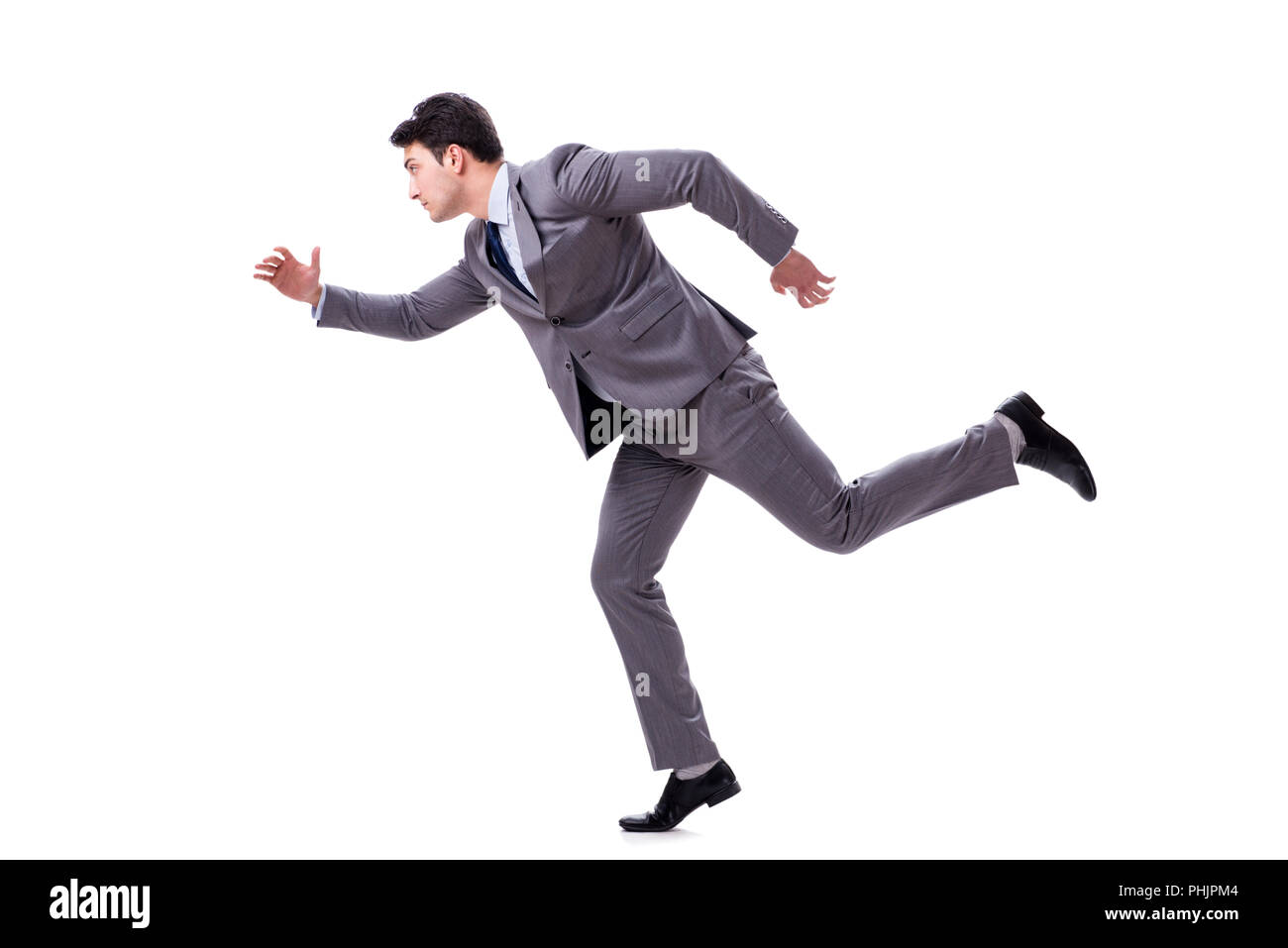 Young businessman running forward isolated on white Stock Photo - Alamy