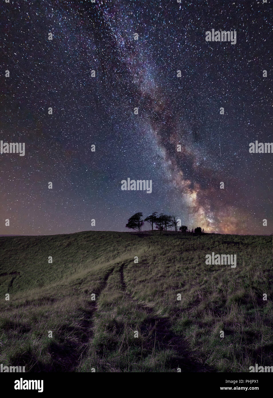 Stunning vibrant Milky Way composite image over landscape of trees in ...