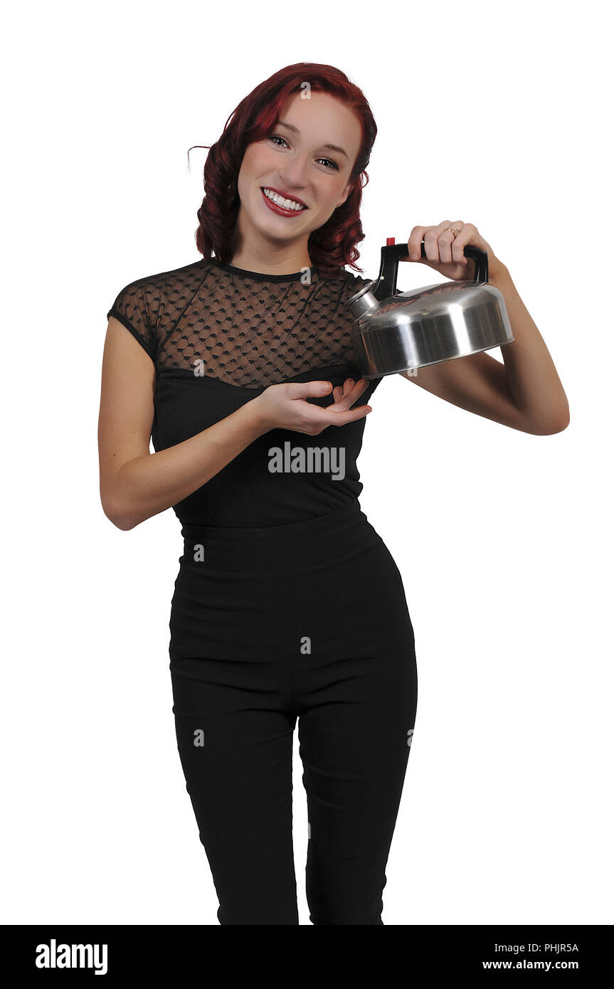 Woman holding tea kettle Stock Photo