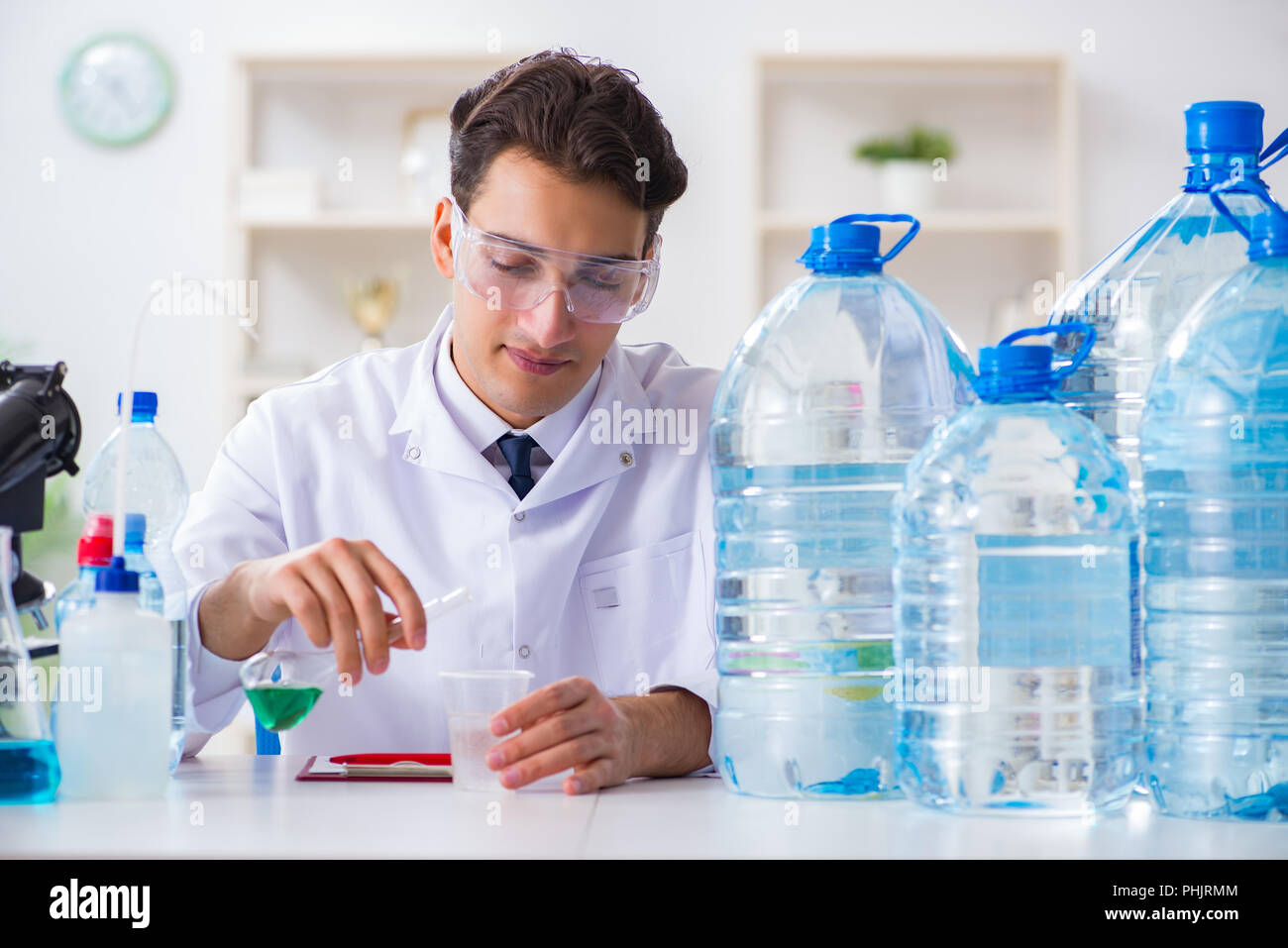 Lab assistant testing water quality Stock Photo Alamy