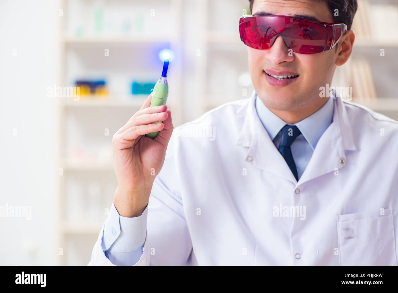 Young dentist working in the dentistry hospital Stock Photo Alamy