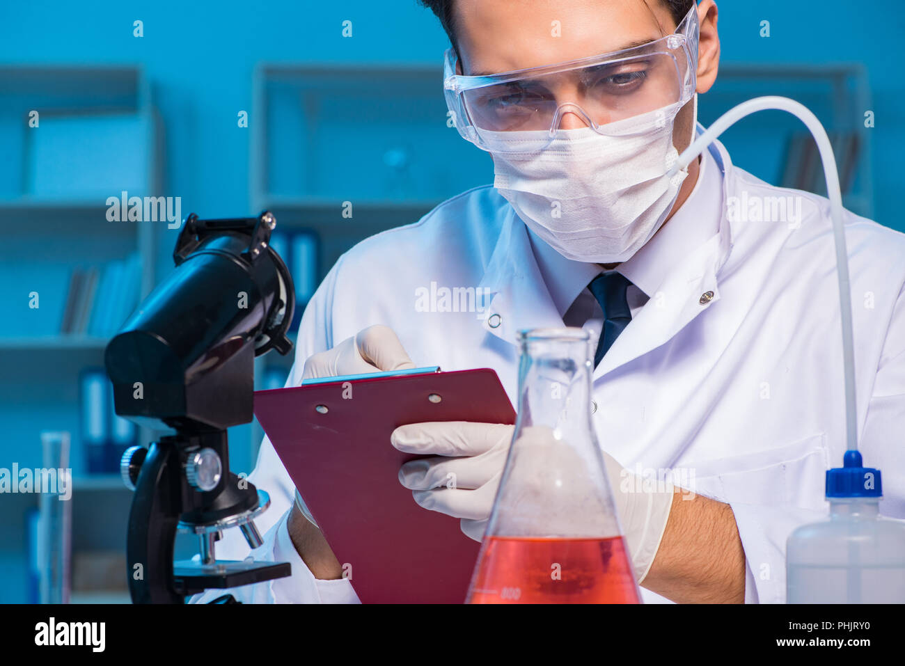 Chemistry assistant working in the chemical lab Stock Photo Alamy
