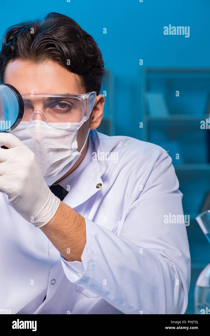 Chemistry assistant working in the chemical lab Stock Photo Alamy