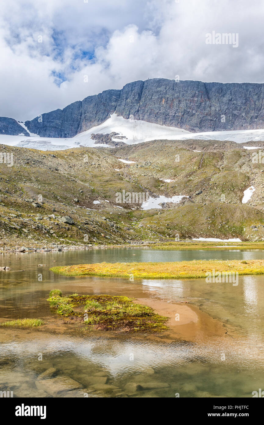 Mountain lake in a high altitude landscape Stock Photo