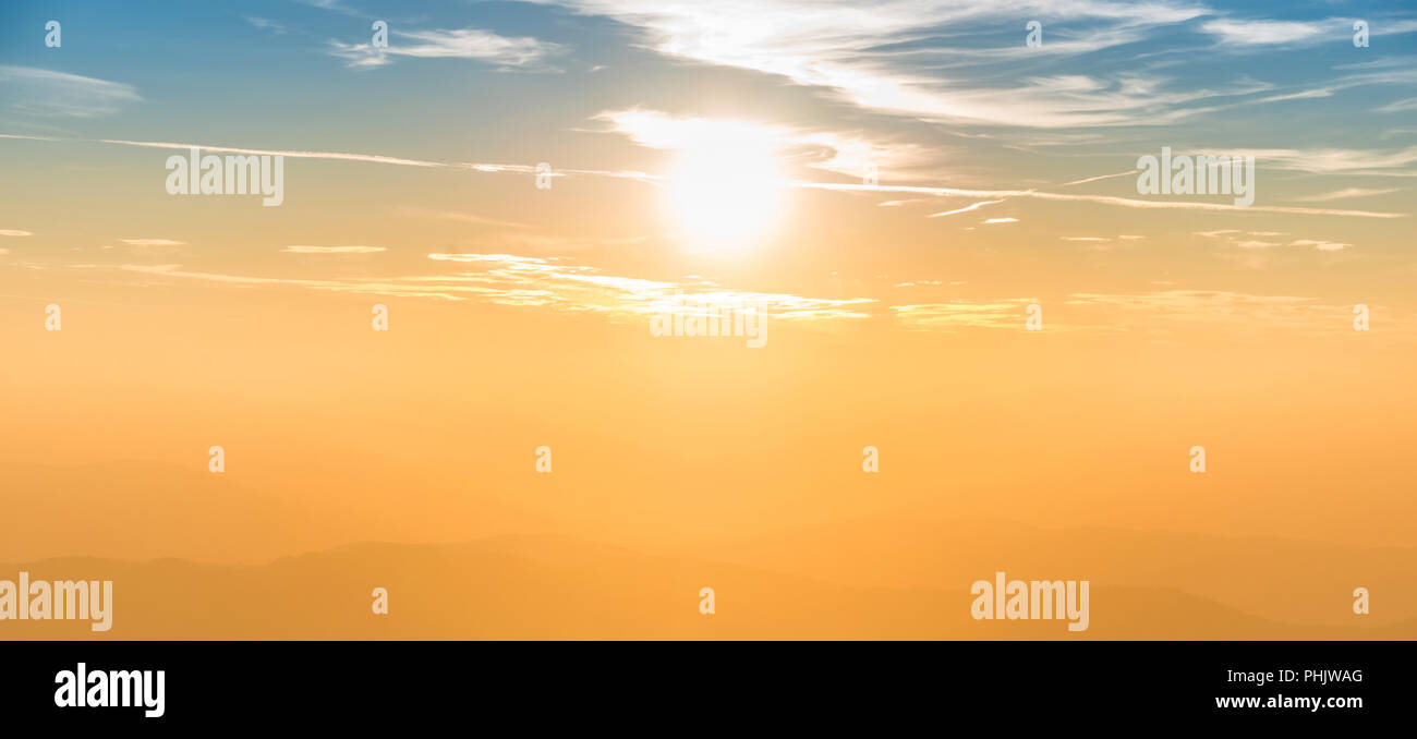 Blue and orange dramatic sky panorama Stock Photo - Alamy