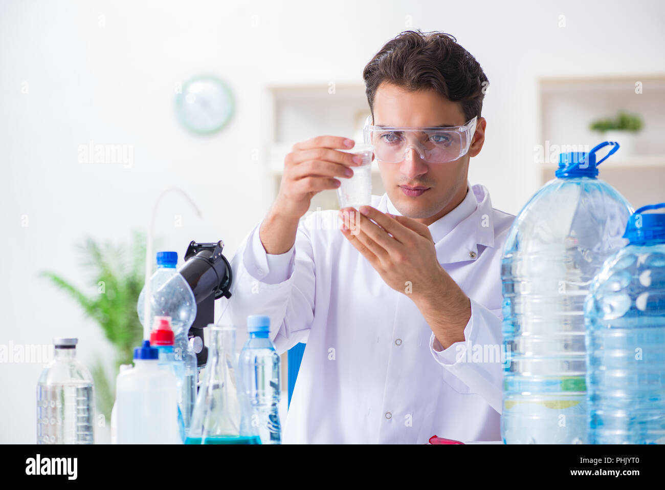 Lab assistant testing water quality Stock Photo - Alamy