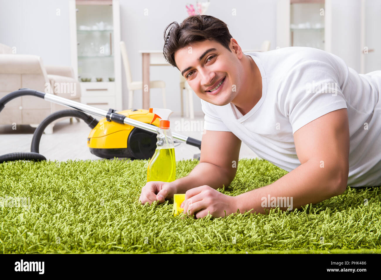 Young husband man cleaning floor at home Stock Photo Alamy