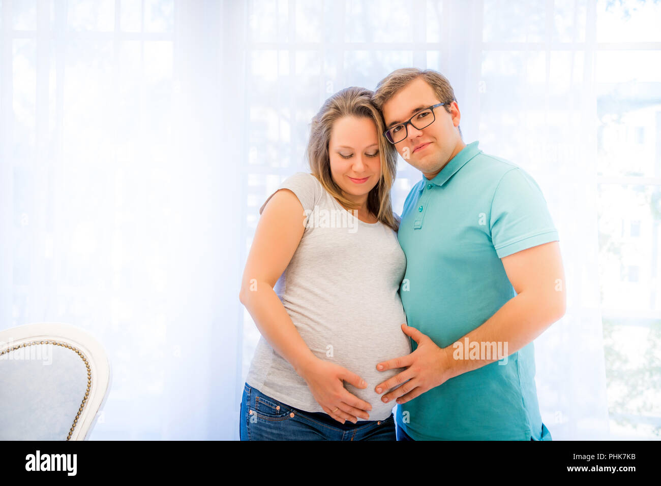 Beautiful couple: pregnant woman and man Stock Photo - Alamy