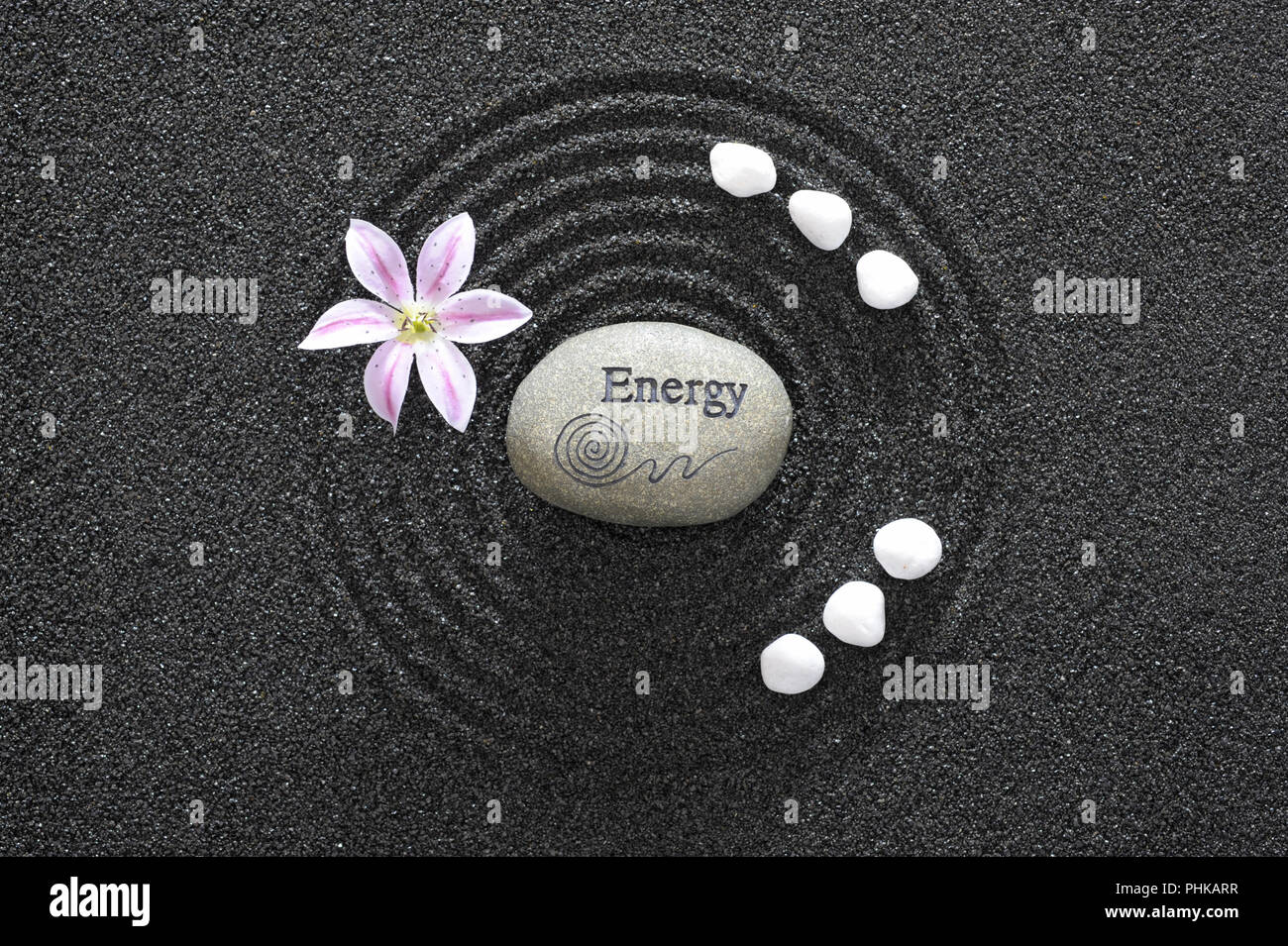 Japanese Zen garden with stone of energy in textured sand Stock Photo ...