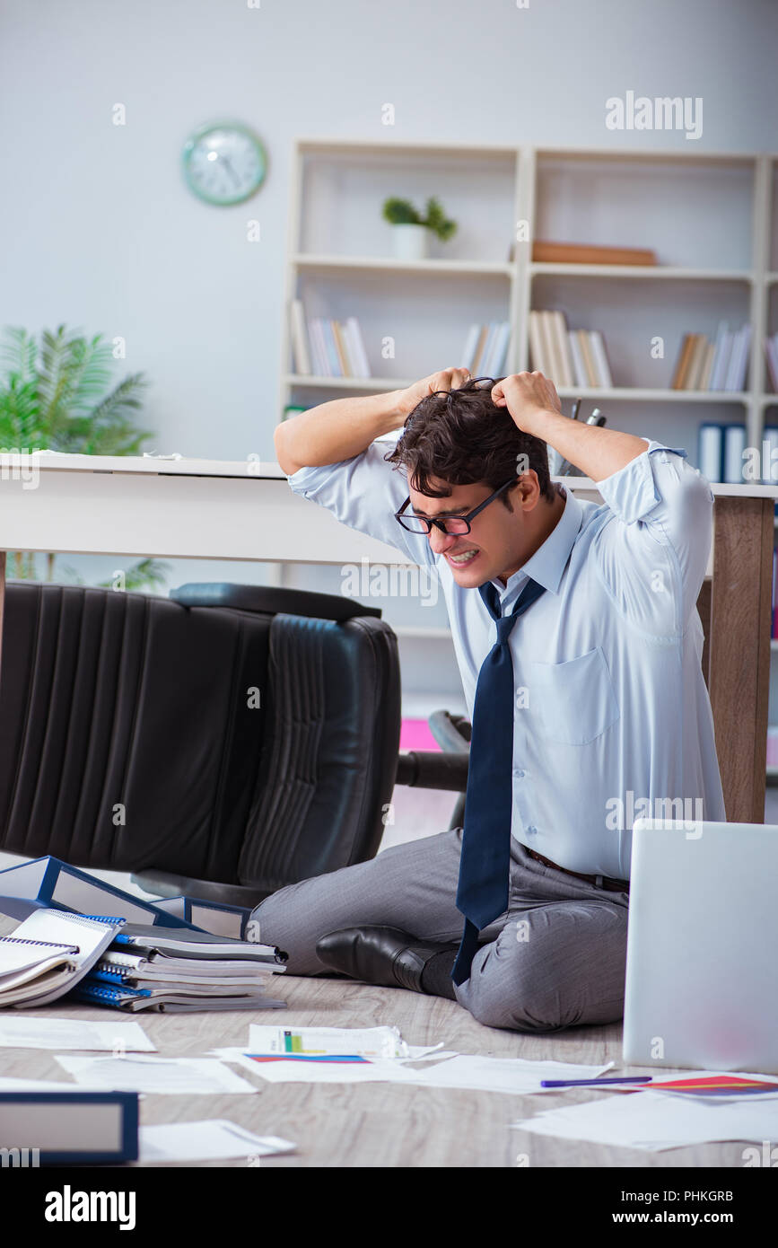 Bankrupt businessman angry in the office floor Stock Photo