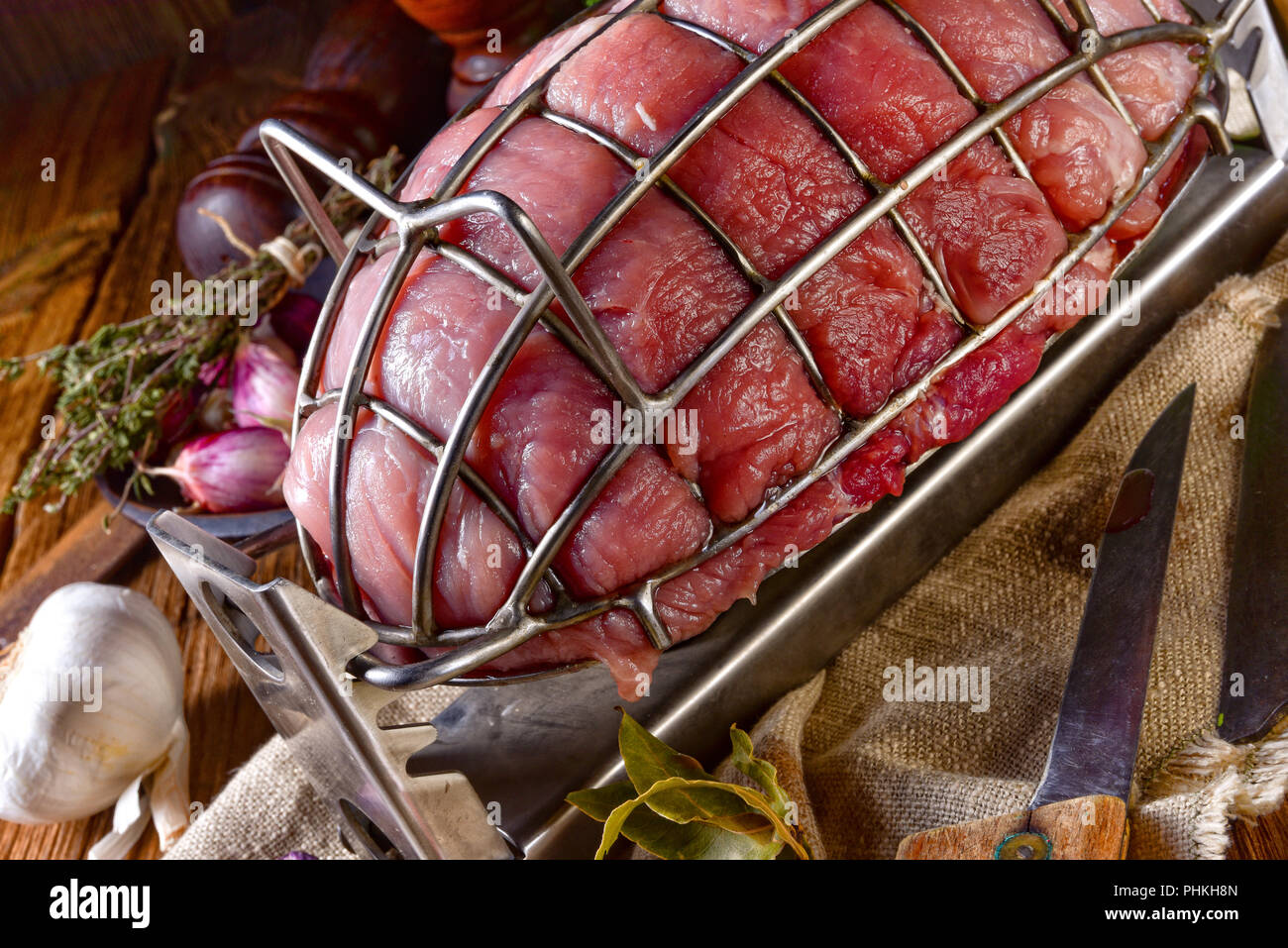 pressure ham cooker with raw ham Stock Photo Alamy