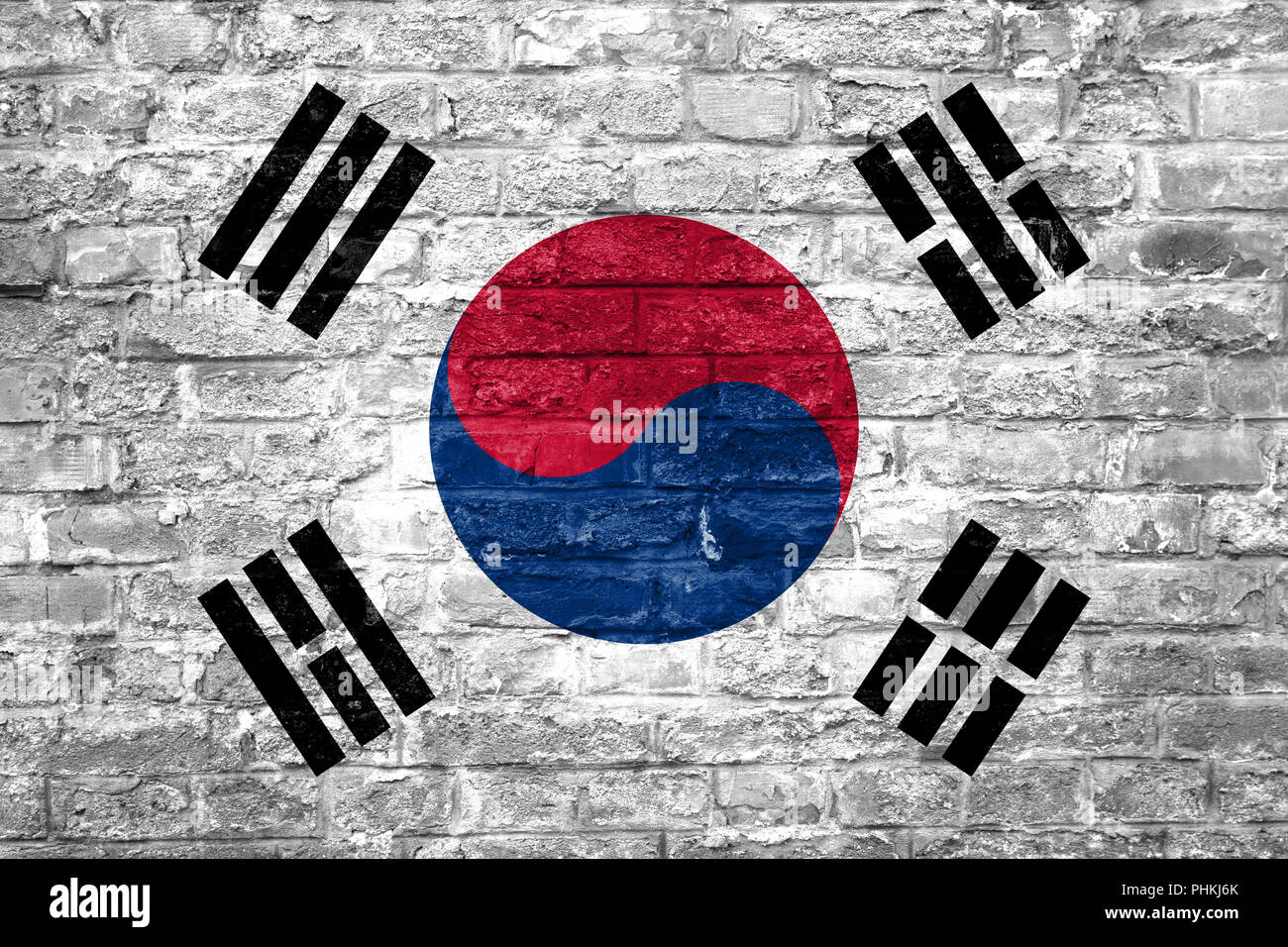 Flag of South Korea over an old brick wall background, surface Stock Photo