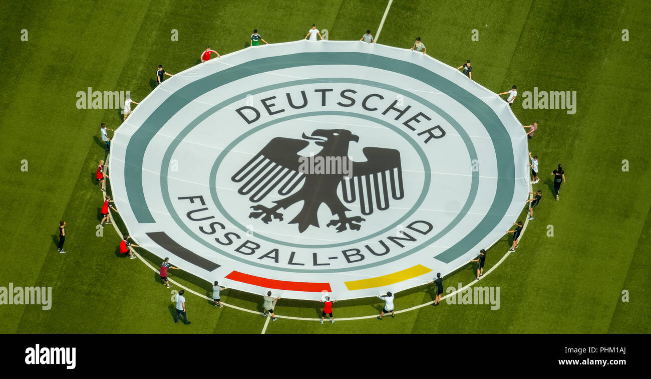 Aerial view, youth players practice rolling out the emblem of the German Football Association, Stadium Niederrhein, Stadion SC Rot-Weiß Oberhausen e.V Stock Photo