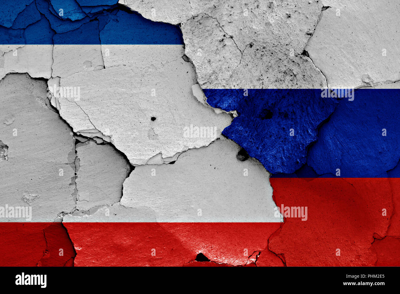 flags of Crimea and Russia painted on cracked wall Stock Photo - Alamy