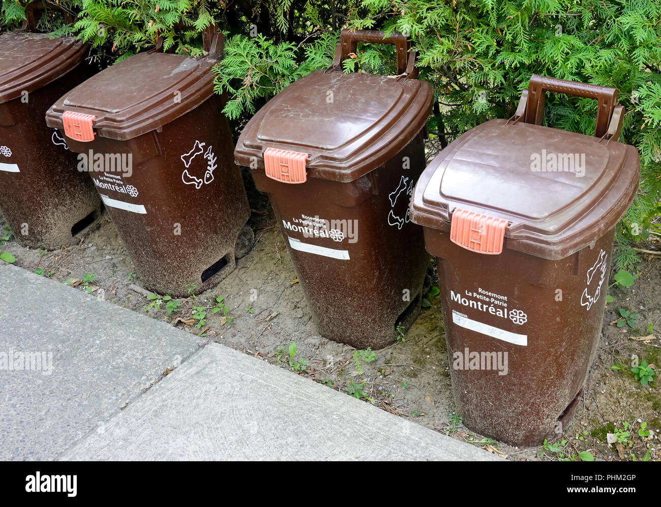 Brown bins for the collection of compost in Montreal, QC, Canada Stock