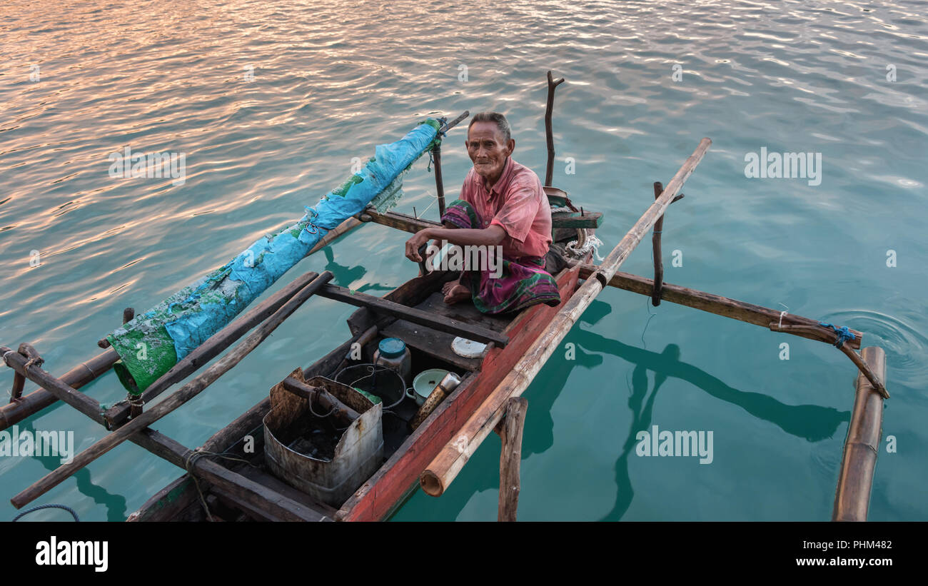 Komodo island fisherman, Liang Bay, Komodo Island, Indonesia Stock Photo