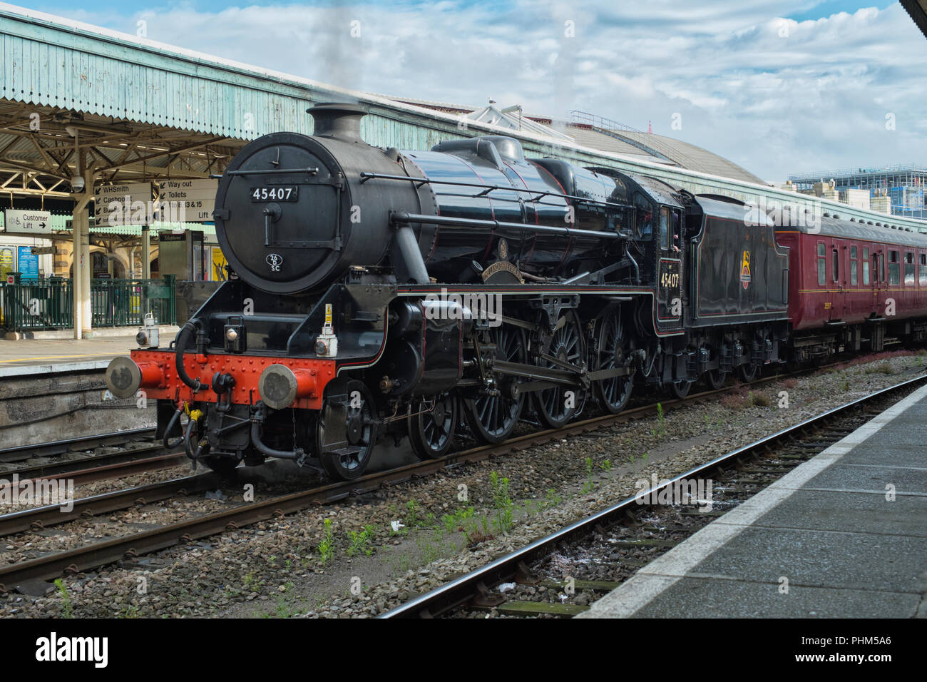 Preserved steam locomotive 'The Lancashire fusiliers' No 45407 at Bristol Temple meads with a special summer excursion. Stock Photo