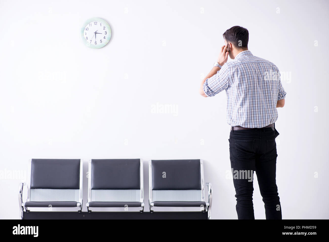 Man nervously impatiently waiting in the lobby Stock Photo - Alamy