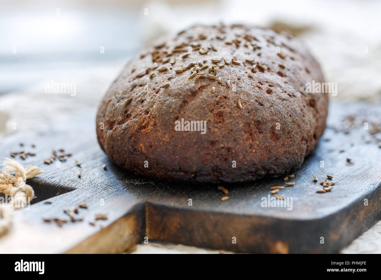 Loaf of artisan rye bread with cumin. Stock Photo