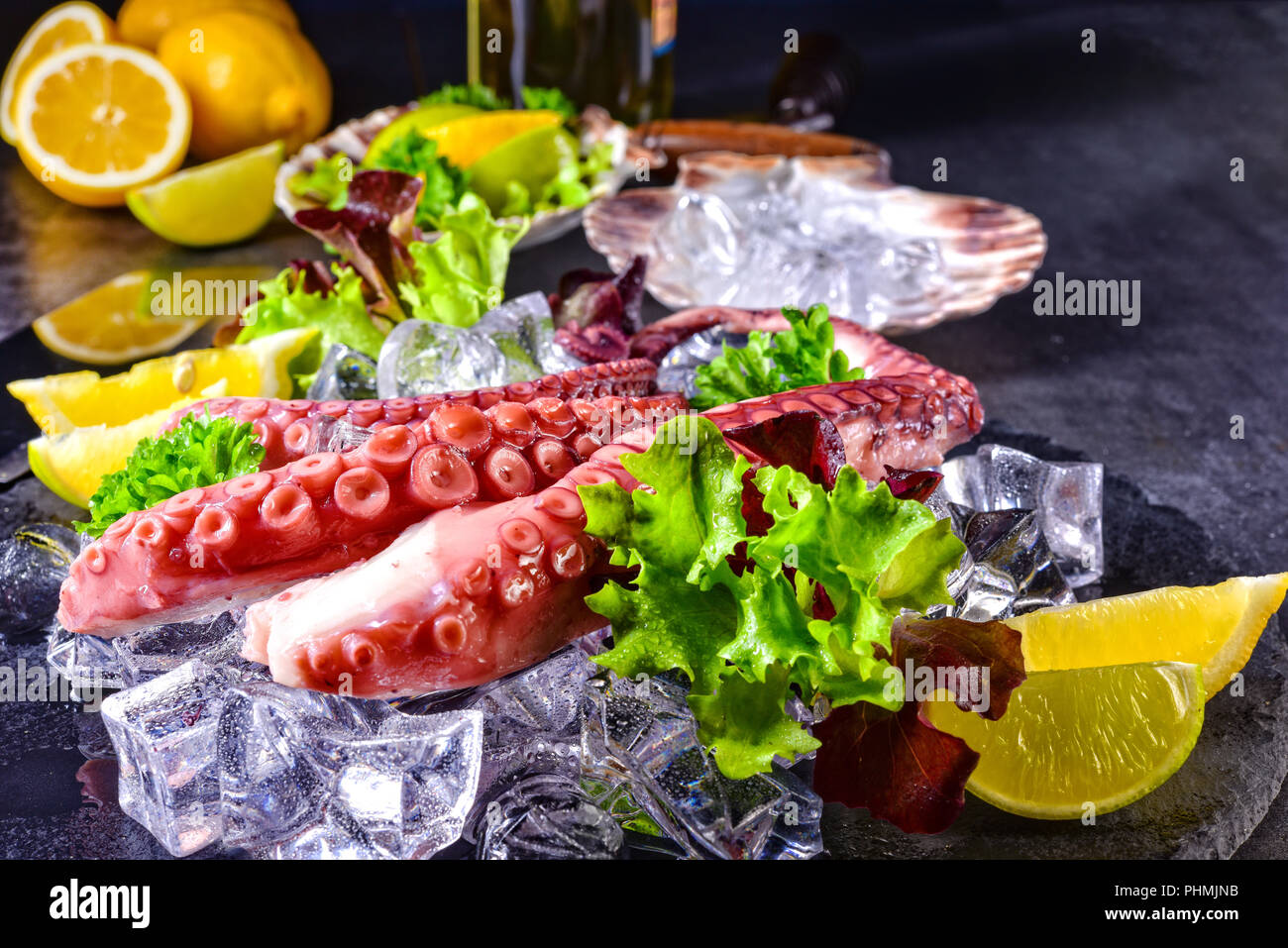 Raw octopus on the ice Stock Photo Alamy