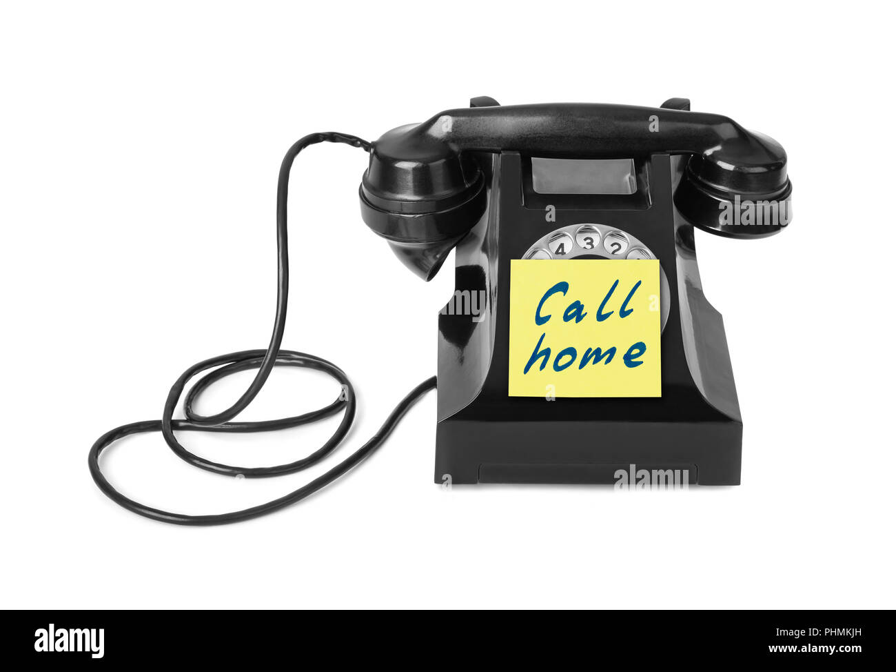 Vintage telephone and paper Call home Stock Photo