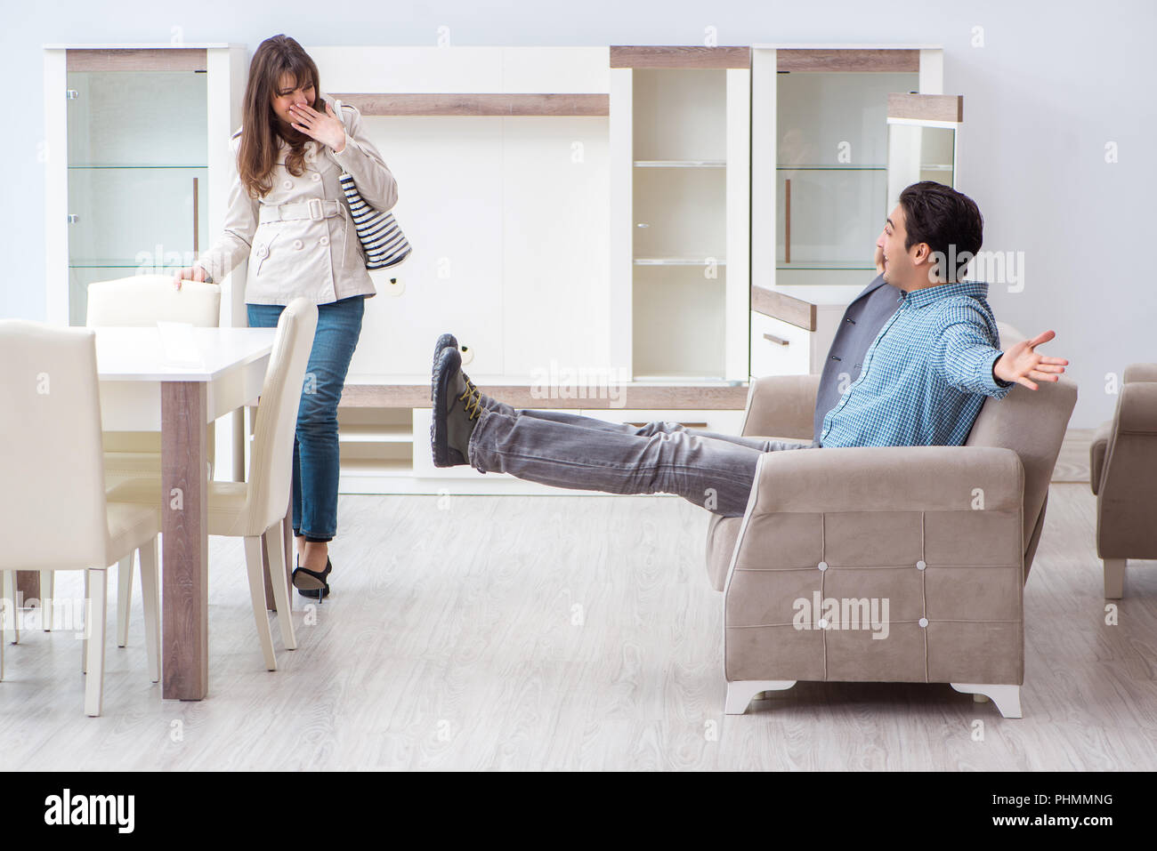 Married couple in the shop choosing furniture Stock Photo