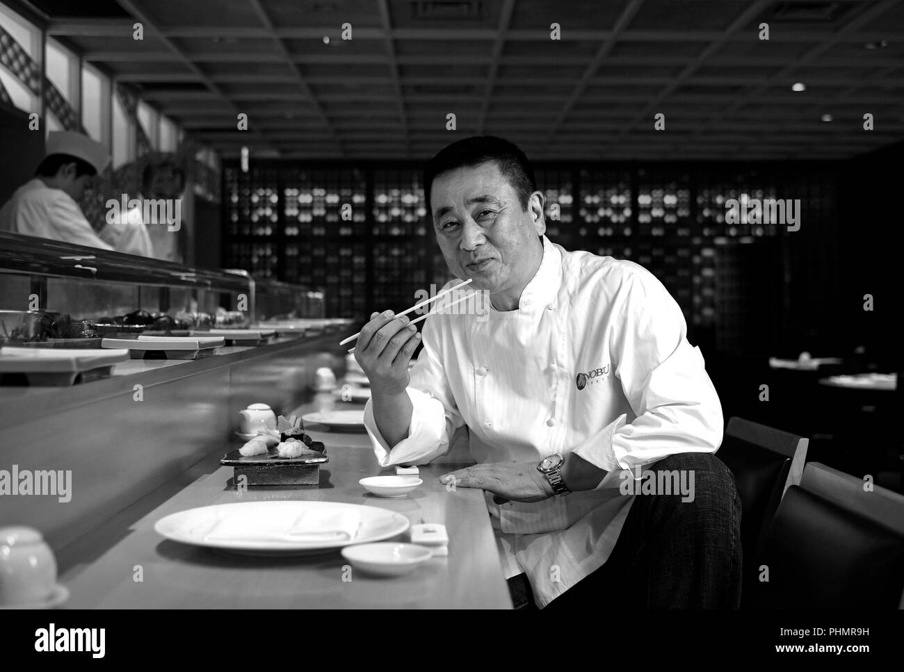 Nobu Matsuhisa sits at the counter of his restaurant in central Tokyo, Japan on 10 July 2008. Stock Photo