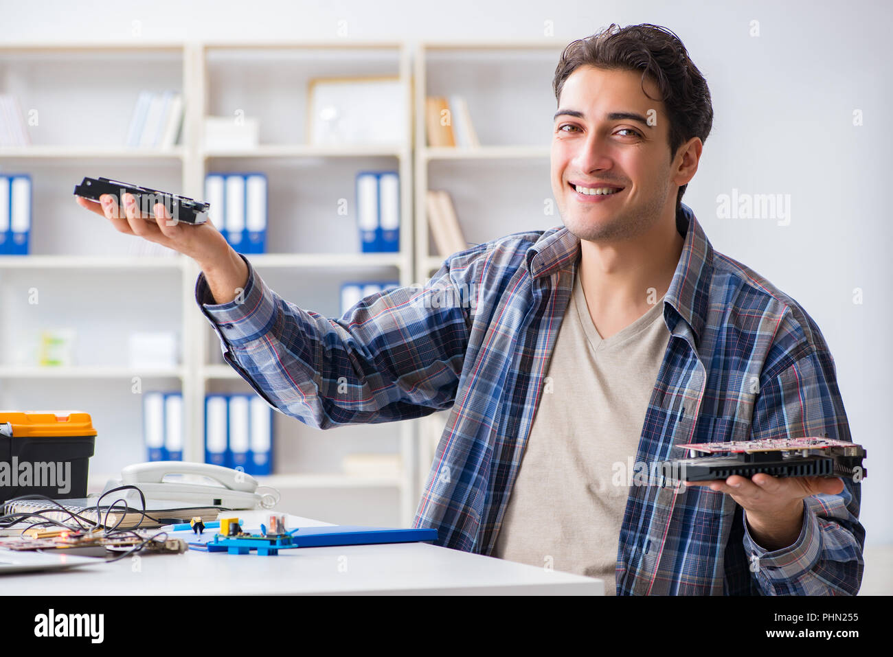 Computer hardware repair and fixing concept by experienced techn Stock