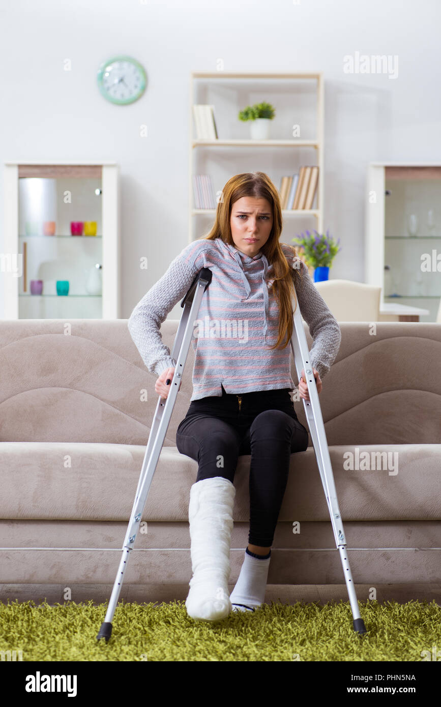 Young woman with broken leg at home Stock Photo - Alamy