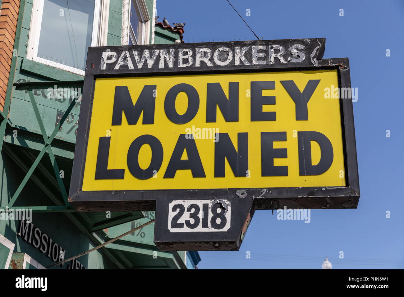 Pawnbrokers – Money Loaned sign; Mission Street, San Francisco, California Stock Photo