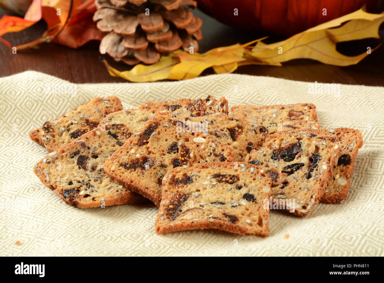 Mini thin sliced toasts with pumpkin, cranberry and seeds Stock Photo