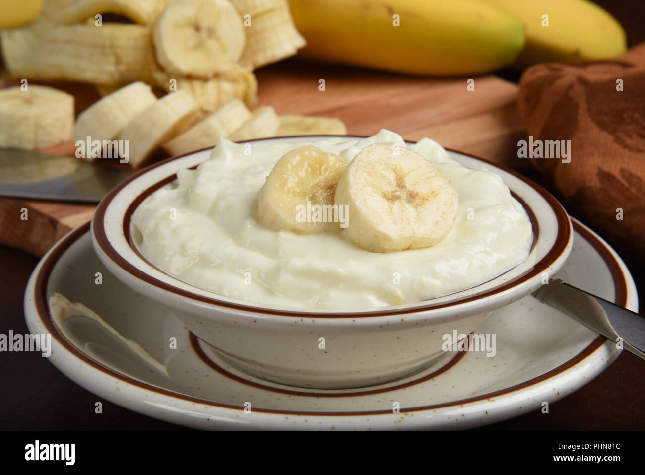 A small bowl of Greek style banana yogurt Stock Photo Alamy