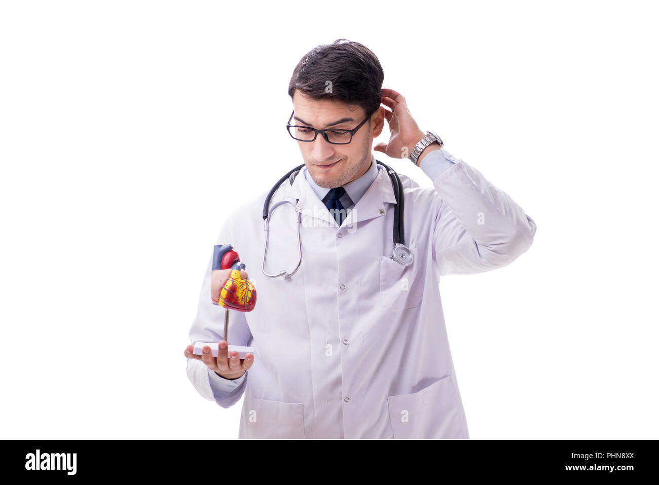 Young doctor with heart shape isolated on white Stock Photo - Alamy