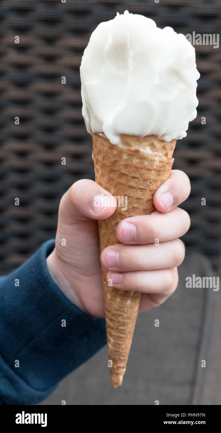 Ice cream in child's hand Stock Photo Alamy