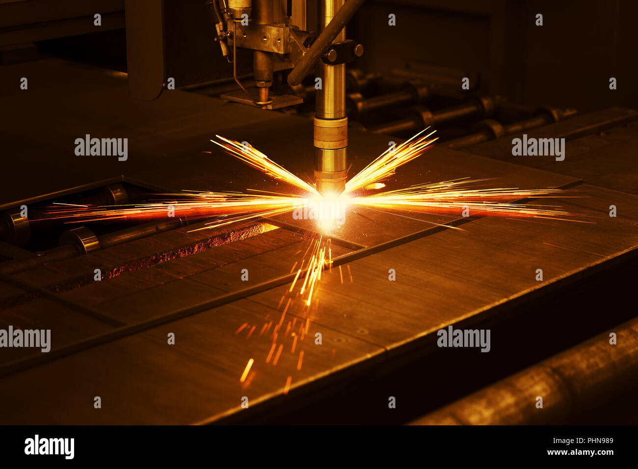 Industrial cnc plasma machine cutting of metal plate Stock Photo Alamy