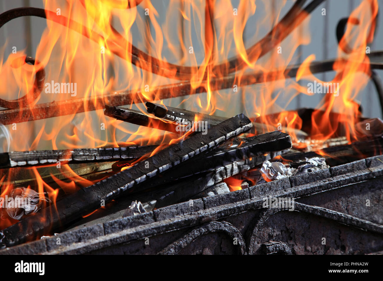 Firewood burn in the oven Stock Photo Alamy