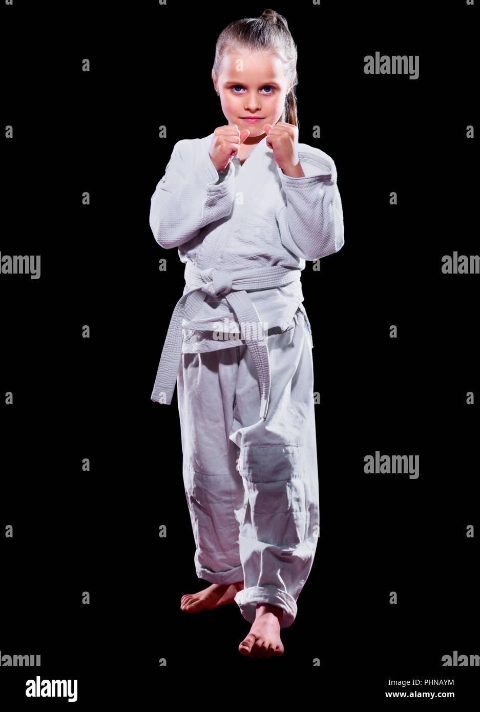 Little girl martial arts fighter isolated Stock Photo Alamy