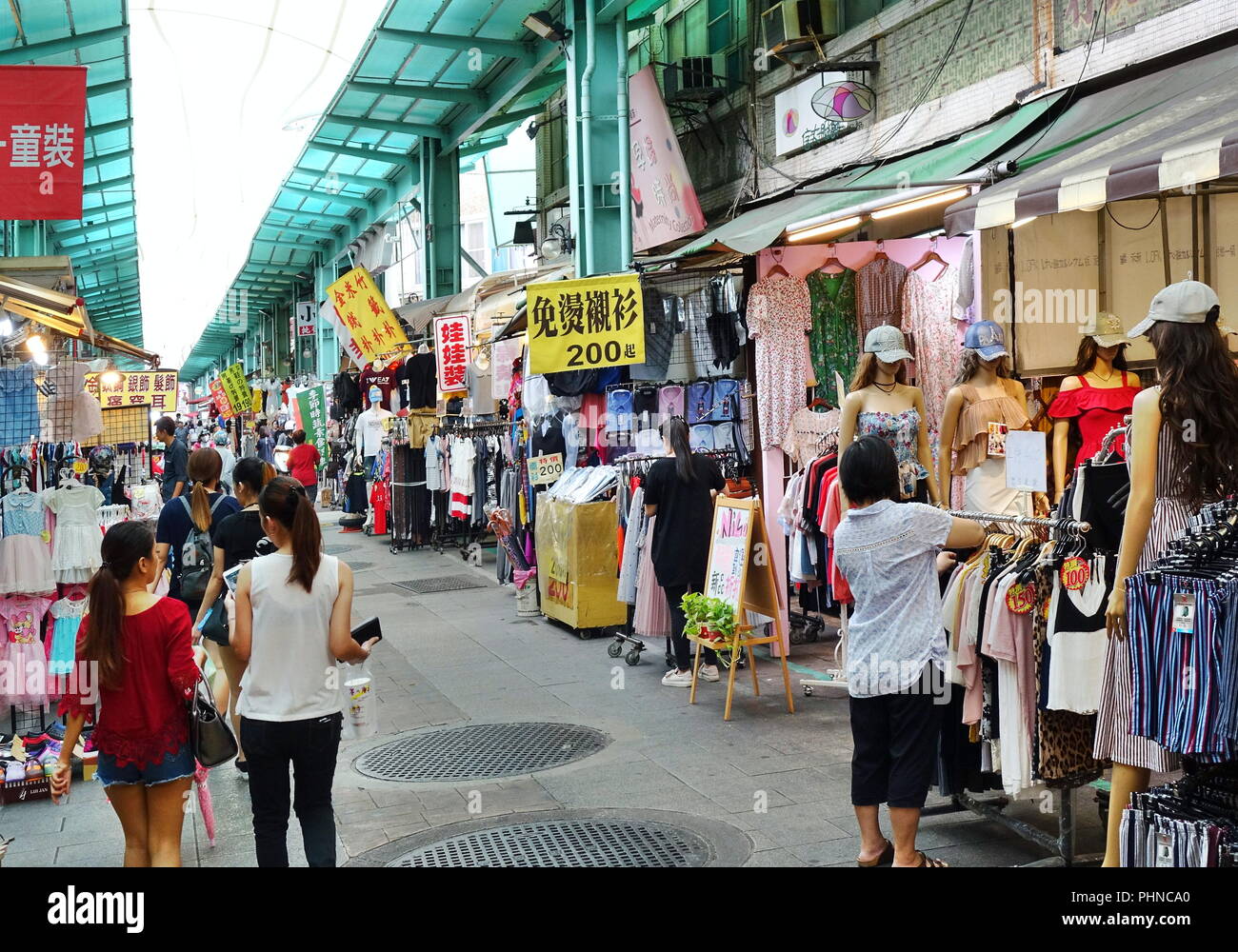 KAOHSIUNG, TAIWAN -- AUGUST 18, 2018: The Nan Hua tourist market sells mainly affordable clothing and shoes for cildren and young people. Stock Photo