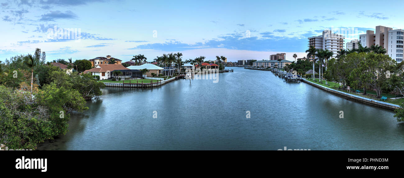 Sunset sky and clouds over the Vanderbilt Channel river Stock Photo