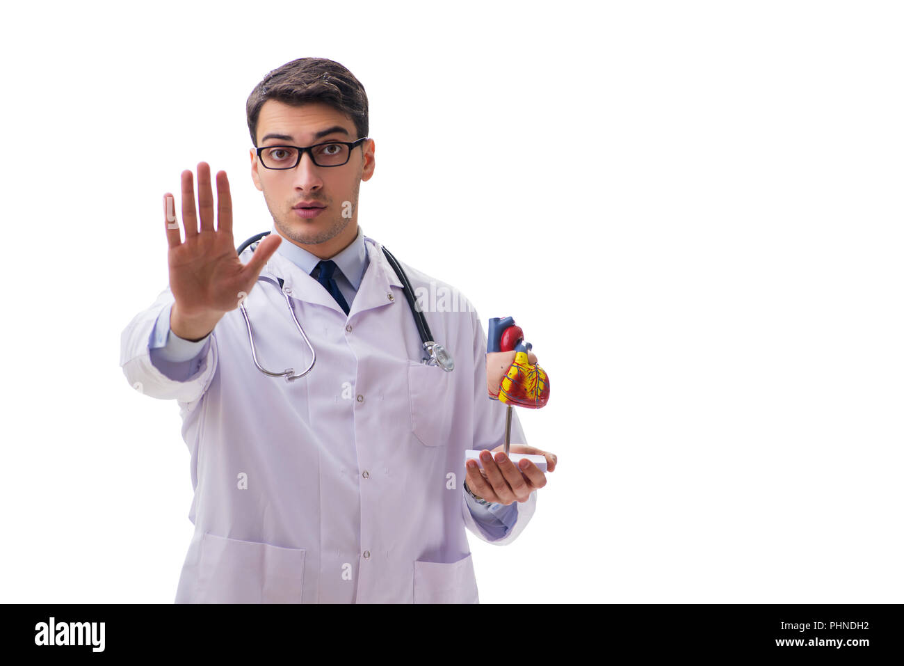 Young doctor with heart shape isolated on white Stock Photo - Alamy